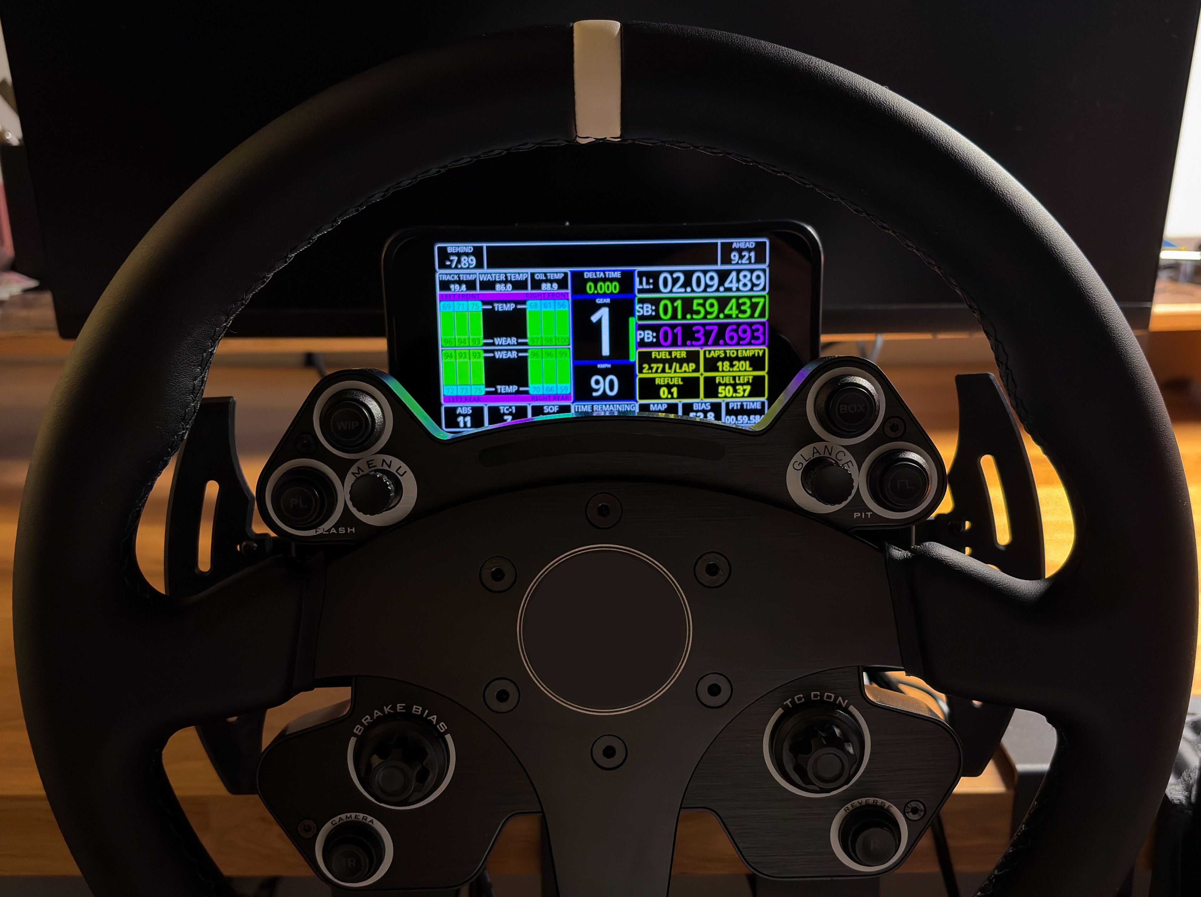 Phone mount attached to the wheelbase with DDU screen attached. 