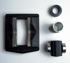 What you get in the box. The base which features stainless steel cams. A bearing block with two heavy duty bearings. A compression spring. A spring seat.